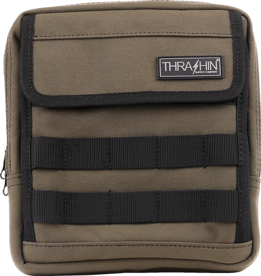 Green THRASHIN SUPPLY CO. Handlebar Bag Slim mounted on a bicycle handlebar, showcasing its compact design and adjustable straps.