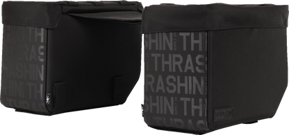 THRASHIN SUPPLY CO. Escape Base Saddlebags TSB-0021, 18L waterproof motorcycle storage bags attached to a motorcycle.