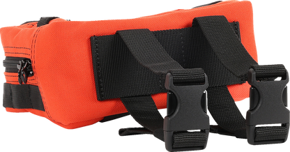 Orange handlebar bag by THRASHIN SUPPLY CO. with adjustable straps and compact design, mounted on a bicycle handlebar.