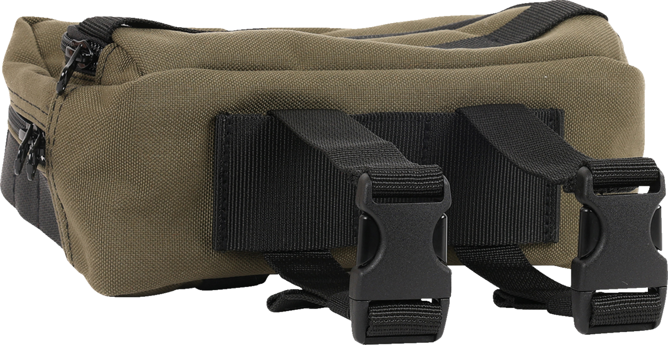 Green THRASHIN SUPPLY CO. Handlebar Bag Plus mounted on a bicycle handlebar, showcasing durable design and easy access storage.