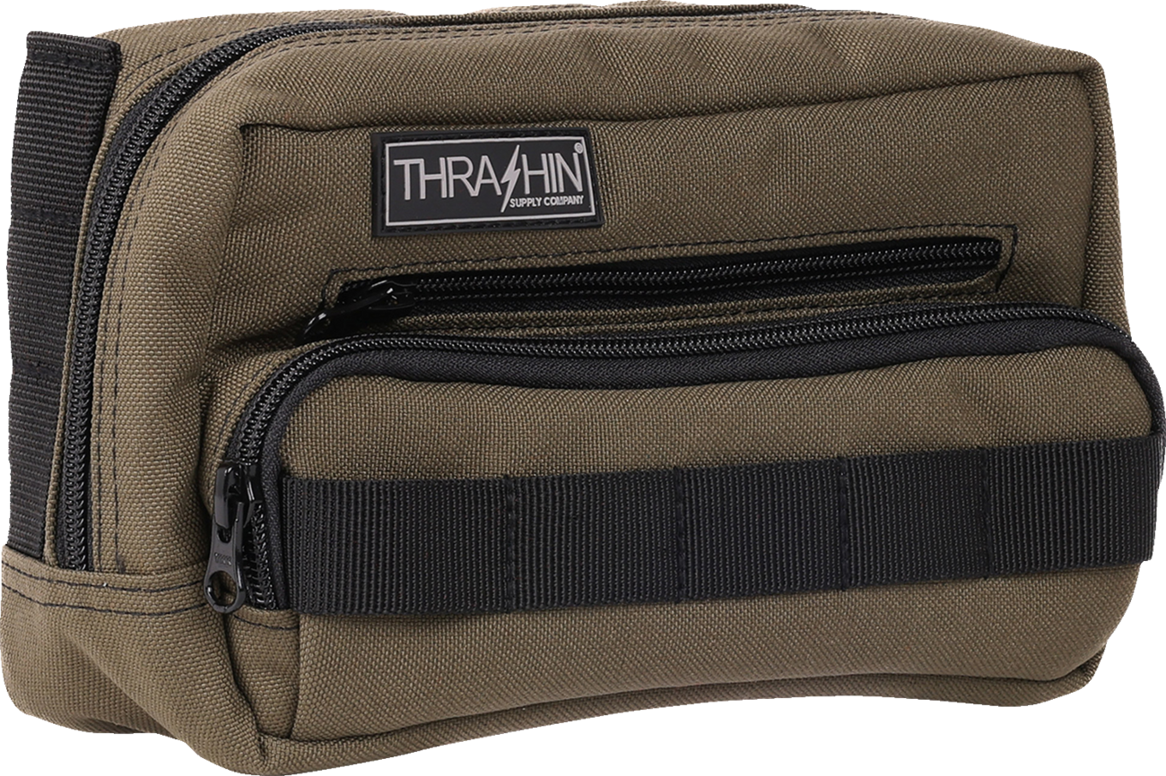 Green THRASHIN SUPPLY CO. Handlebar Bag Plus mounted on a bicycle handlebar, with straps and zipper closure visible in the image.