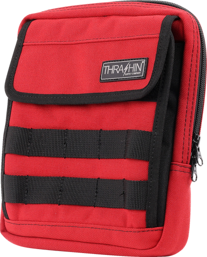 Red THRASHIN SUPPLY CO. Handlebar Bag Slim (THB-0034) mounted on a bicycle handlebar, compact and sleek for bike storage.