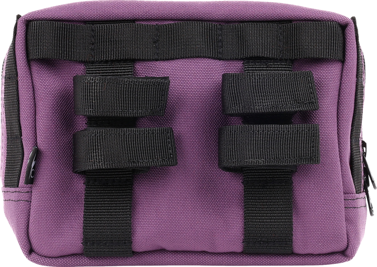 Purple handlebar bag from THRASHIN SUPPLY CO. with adjustable straps, designed for bike storage and easy access.