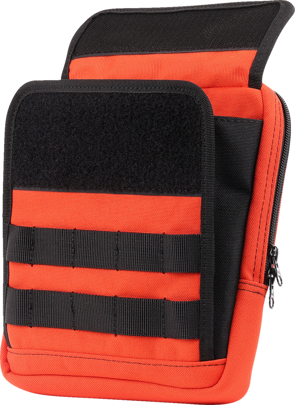 Orange Thrashin Supply Co. handlebar bag slim THB-0035 mounted on a bicycle handlebar, compact and lightweight for riding gear storage.