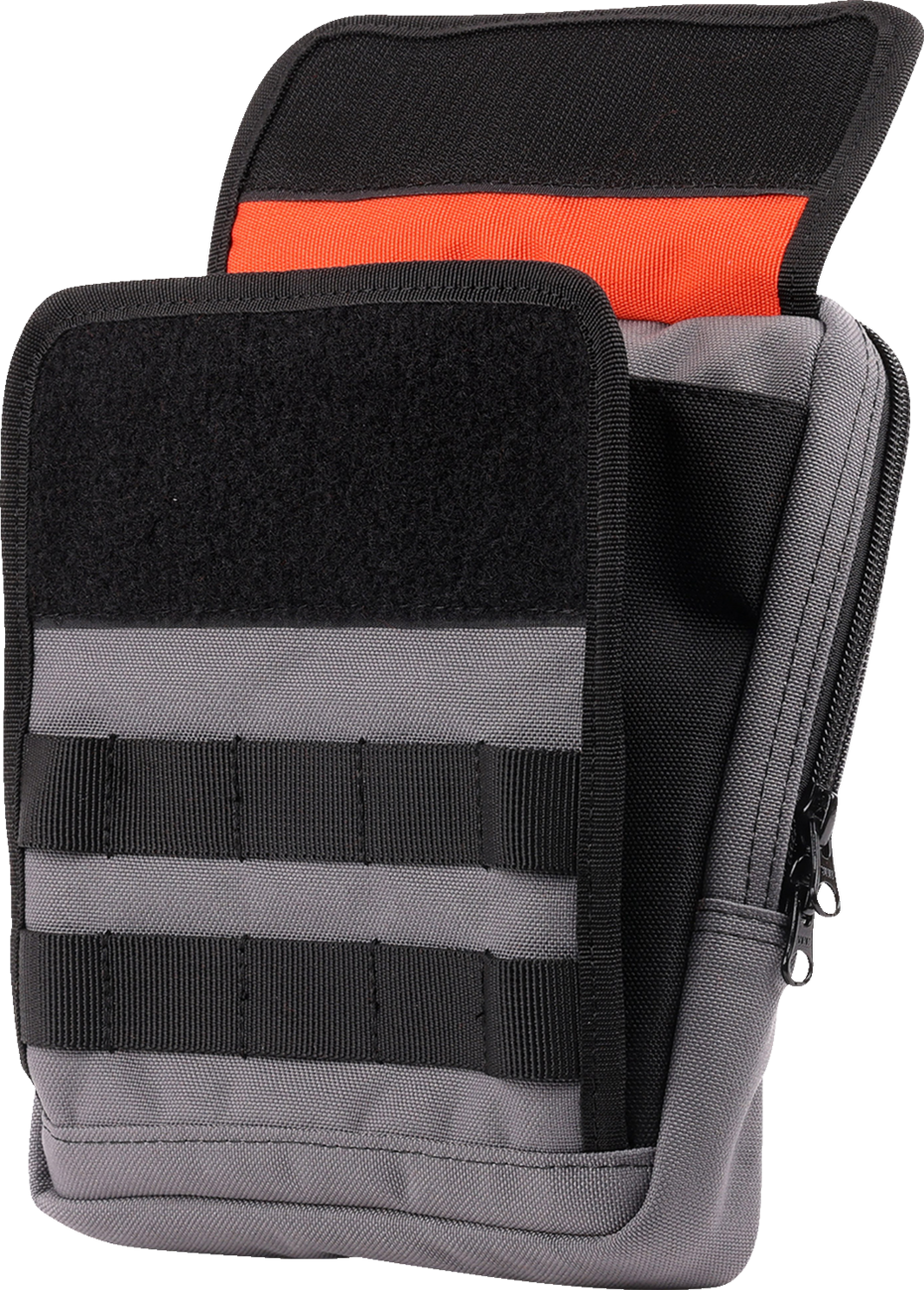 Gray THRASHIN SUPPLY CO. Handlebar Bag Slim attached to a bicycle handlebar, showcasing its compact design and durable material.