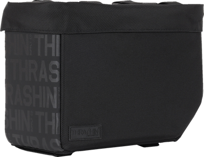Waterproof motorcycle saddlebags by THRASHIN SUPPLY CO. Escape Base TSB-0021, 18-liter storage bags mounted on a motorcycle.