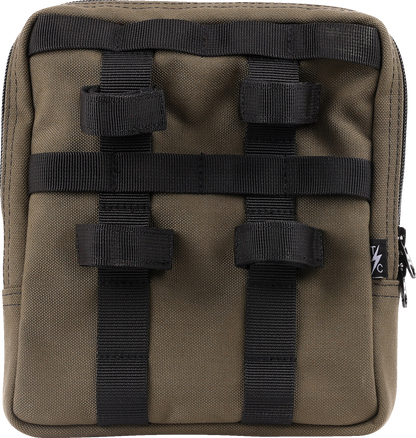 Green THRASHIN SUPPLY CO. Handlebar Bag Slim mounted on a bicycle handlebar, showcasing its compact design and secure strap system.
