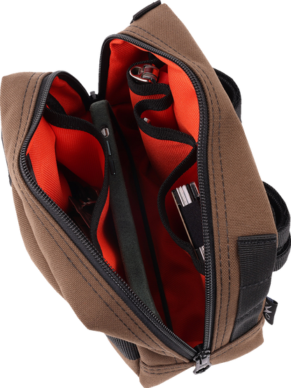 Brown THRASHIN SUPPLY CO. handlebar bag with MOLLE webbing and attachment points, designed for cycling and outdoor adventures.
