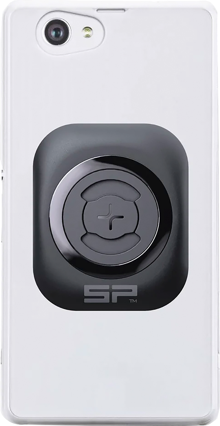 SP CONNECT universal phone mount with adhesive pad, designed for secure attachment to various surfaces, compatible with SPC+ models.