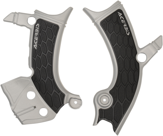 Acerbis X-Grip Frame Guards in silver and black mounted on a motorcycle frame for protection and style.