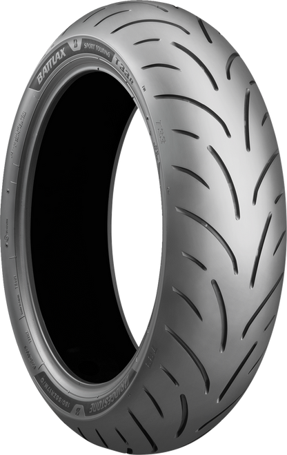 Bridgestone T33 rear motorcycle tire 160/60ZR17 showing tread pattern and sidewall with branding and size details.