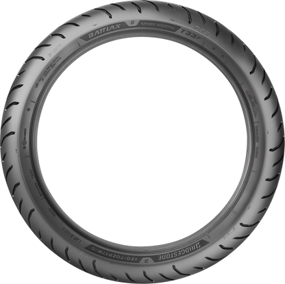 BRIDGESTONE T33 front motorcycle tire with 120/70R19 size and 60V load rating, shown mounted on a bike wheel.
