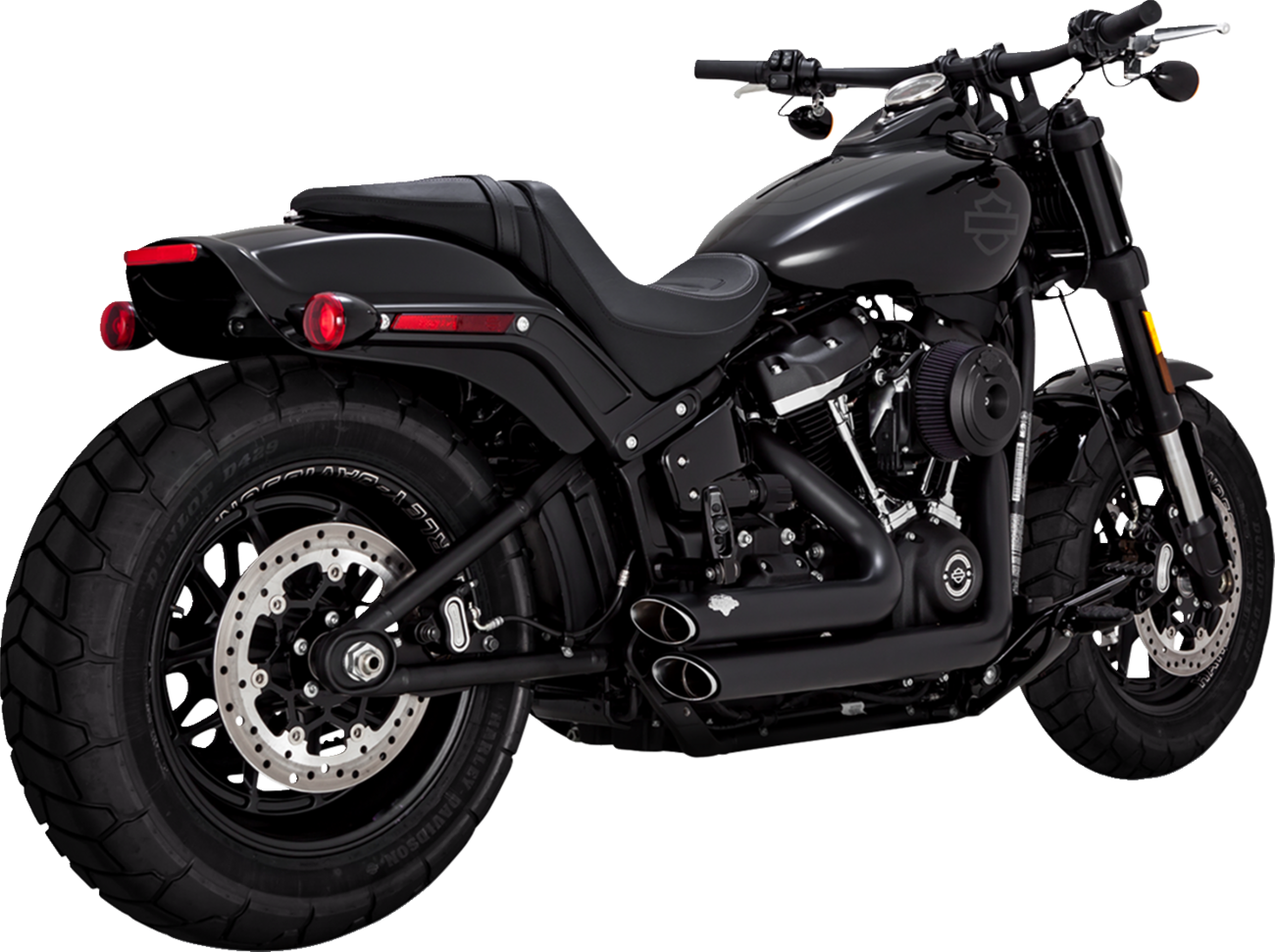 VANCE & HINES Shortshots Staggered PCX™ exhaust system in matte black for motorcycle, showing the sleek, curved exhaust pipes.