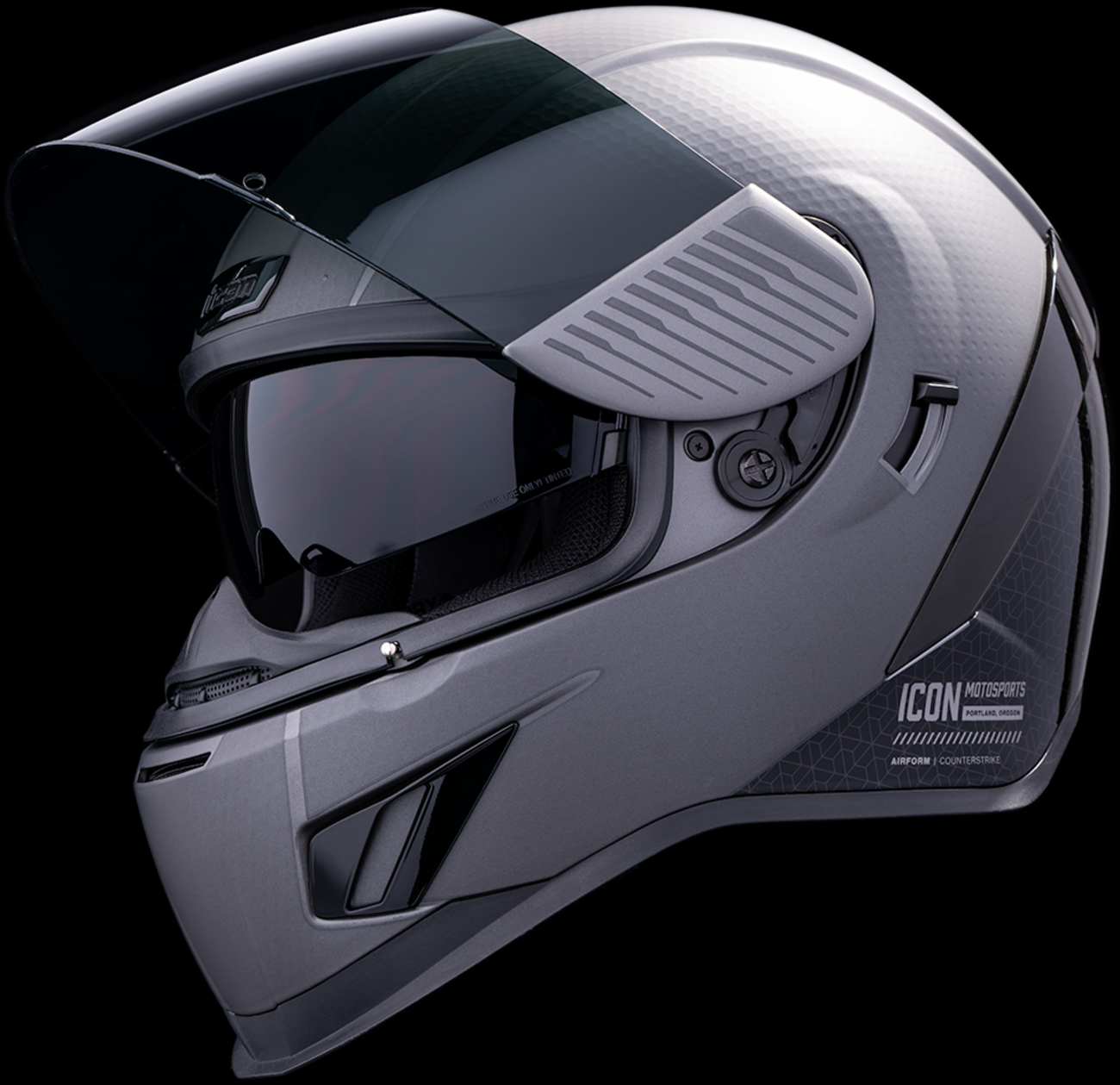 Silver ICON Airform™ Helmet with MIPS® technology, small size, featuring a sleek design, for motorcycle or bike riding safety.