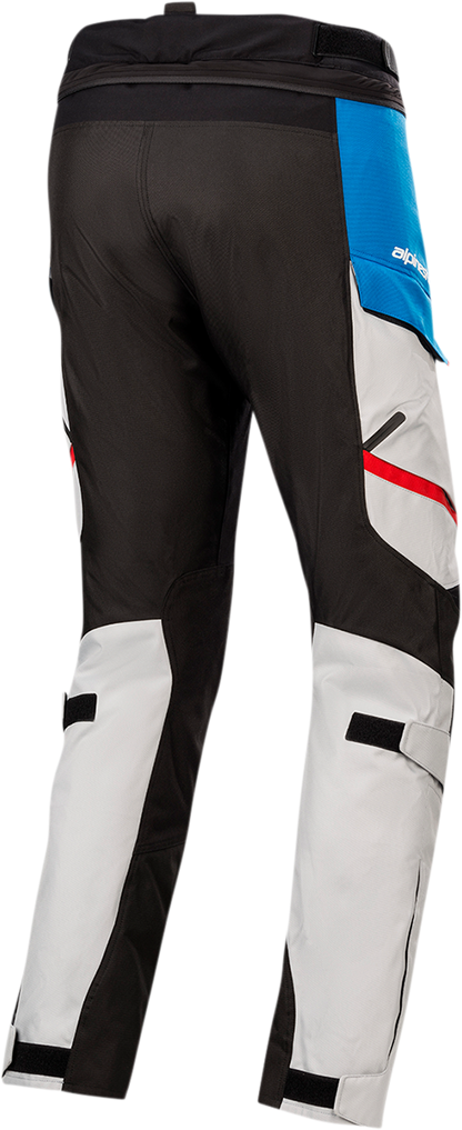 Alpinestars Honda Andes v3 Drystar® motorcycle pants in gray, blue, and red with protective padding, small size, front view.