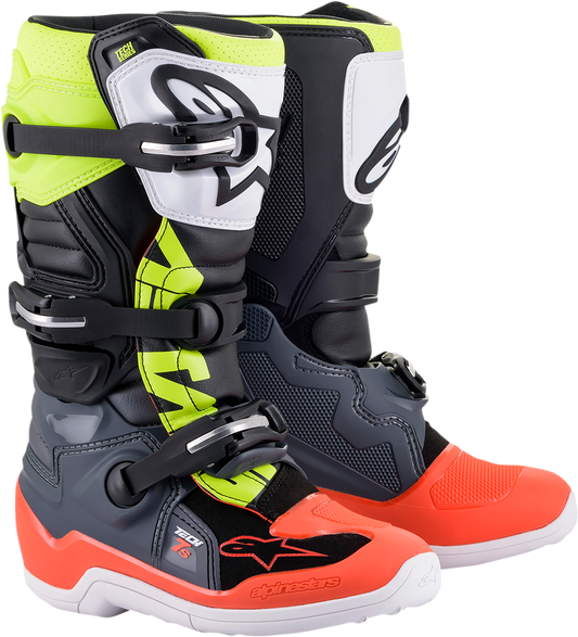 Alpinestars Youth Tech 7S motorcycle boots in black, gray, red, white, and yellow with protective features and adjustable straps.