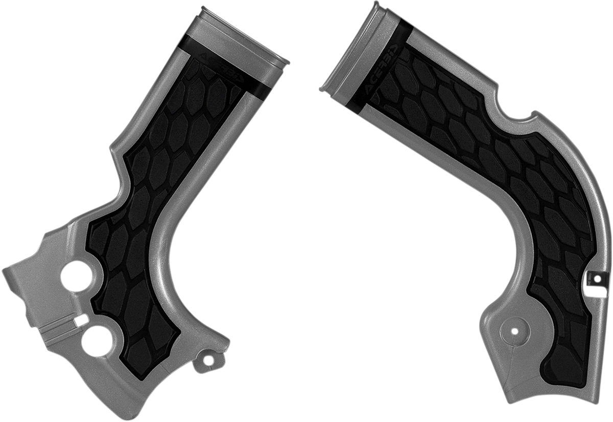 Acerbis X-Grip motorcycle frame guards in silver and black attached to a bike body, providing protection and style.
