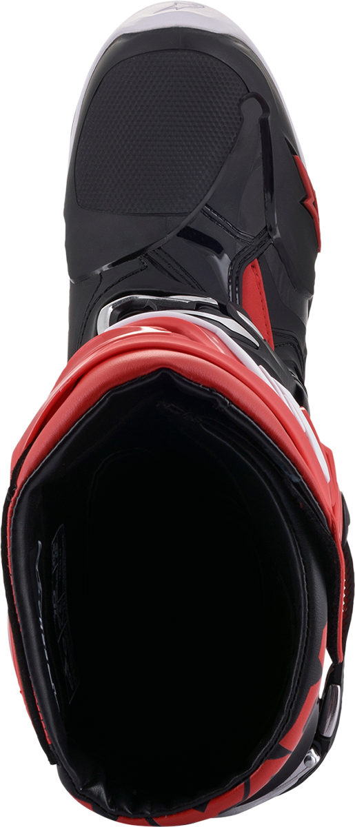 Alpinestars Tech 10 motorcycle boots in black and red, US size 13, featuring rugged design and protective features.