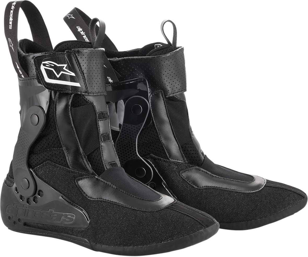 Alpinestars Tech 10 inner booties in size 11, black and gray, designed for motorcycle boots, with protective padding visible.