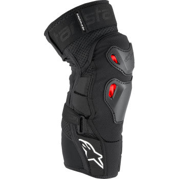 Black, red, and white ALPINESTARS Bionic Pro Plasma knee protectors in size L/XL, designed for motorcycle safety and impact protection.