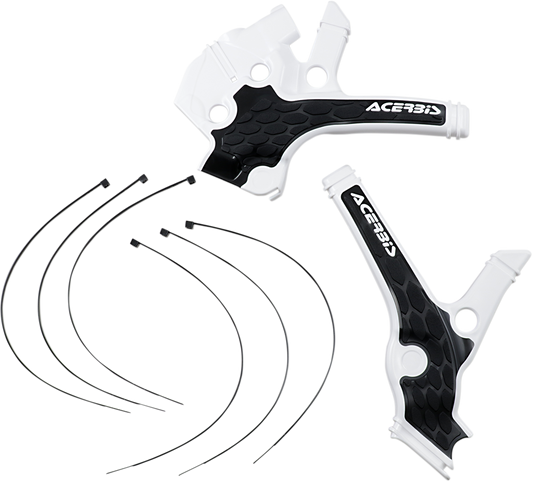 Acerbis X-Grip Frame Guards in black and white attached to motorcycle frame for protection and style.