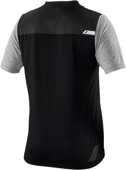 Black and charcoal Bill's Exhausts 100% Airmatic Jersey short-sleeve shirt in medium size, showcasing the jersey's fabric and design.