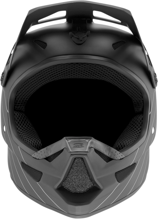 Black 100% Youth Status bicycle helmet in medium size with adjustable straps and ventilation for kids' cycling safety.