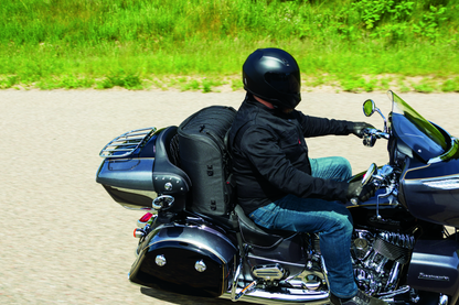 Kuryakyn Momentum Wanderer Seat Bag with 60L capacity, padded backrest, and organized compartments for touring motorcycle passenger storage.