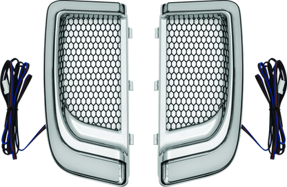 Chrome Kuryakyn Tracer Lower Fairing Grill for Harley Davidson Touring models, showcasing a sleek, polished motorcycle accessory.