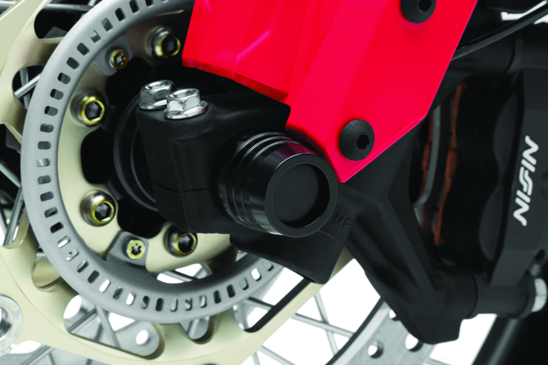 Kuryakyn front axle slide for Honda CRF1000L Africa Twin and Adventure Sports motorcycle, part #3823, installed on front wheel axle