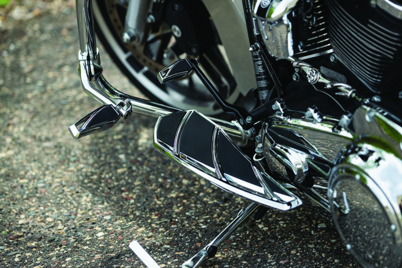 Chrome Kuryakyn Phantom Floorboards for Harley-Davidson motorcycles with detailed grip surface and mounting hardware.