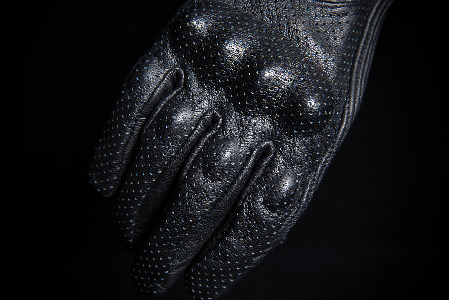 ICON Women's Pursuit Classic™ perforated black gloves in 2XL size, showing the textured perforation and sporty design details.