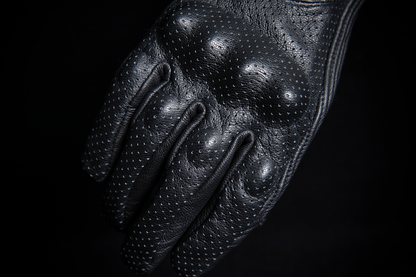 ICON Women's Pursuit Classic™ perforated black gloves in 2XL size, showing the textured perforation and sporty design details.