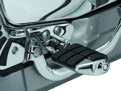 Kuryakyn driver peg mounts in chrome for Honda Gold Wing GL1800 and F6B motorcycle, showing shiny metal brackets and mounting hardware.