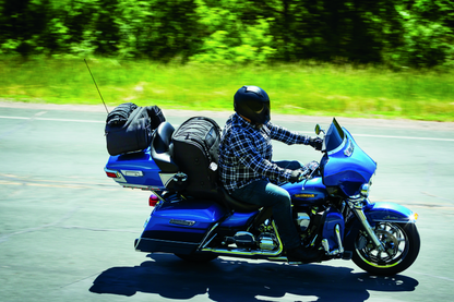 Kuryakyn Momentum Wanderer Seat Bag with 60L capacity, padded backrest, and organized compartments for touring passenger storage.