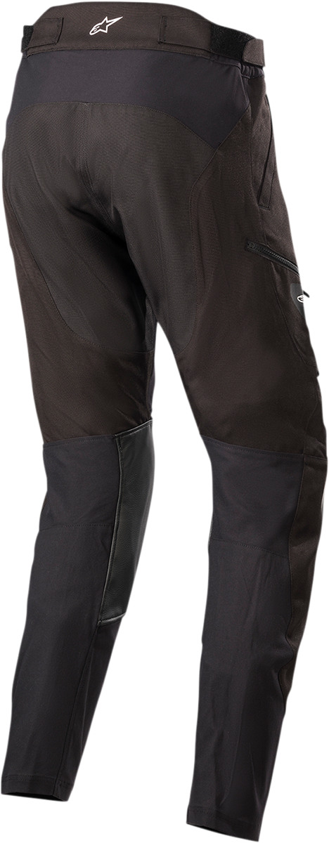 Alpinestars Venture XT black in-the-boot motorcycle pants with reinforced knee areas and adjustable waist, large size.