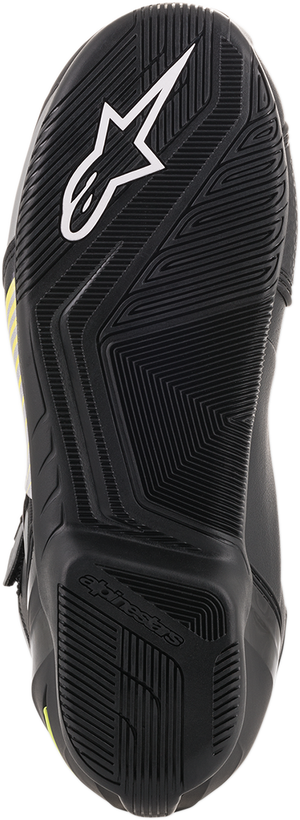 Alpinestars SP-1 v2 riding shoes in black, silver, and yellow featuring protective design and sturdy construction for motorcycling.