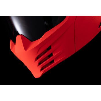 Red ICON Elsinore™ helmet in medium size with Monotype design, featuring a sleek helmet shape and detailed graphics.