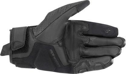 Black Alpinestars Celer V3 motorcycle gloves in XL size, showing the textured palm and secure wrist strap.