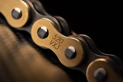 Warp9Racing DID VX3 520 chain displaying the silver metal links and branding for high-performance motorcycle chain.