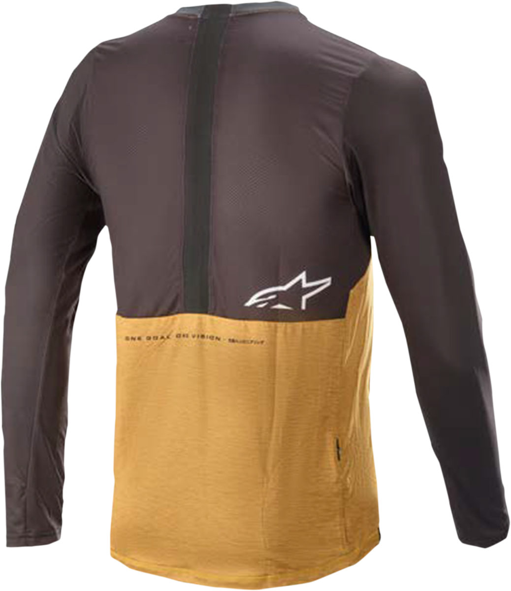 Alpinestars Alps 6.0 V2 long-sleeve motorcycle jersey in orange and black, size medium, featuring lightweight, breathable fabric.