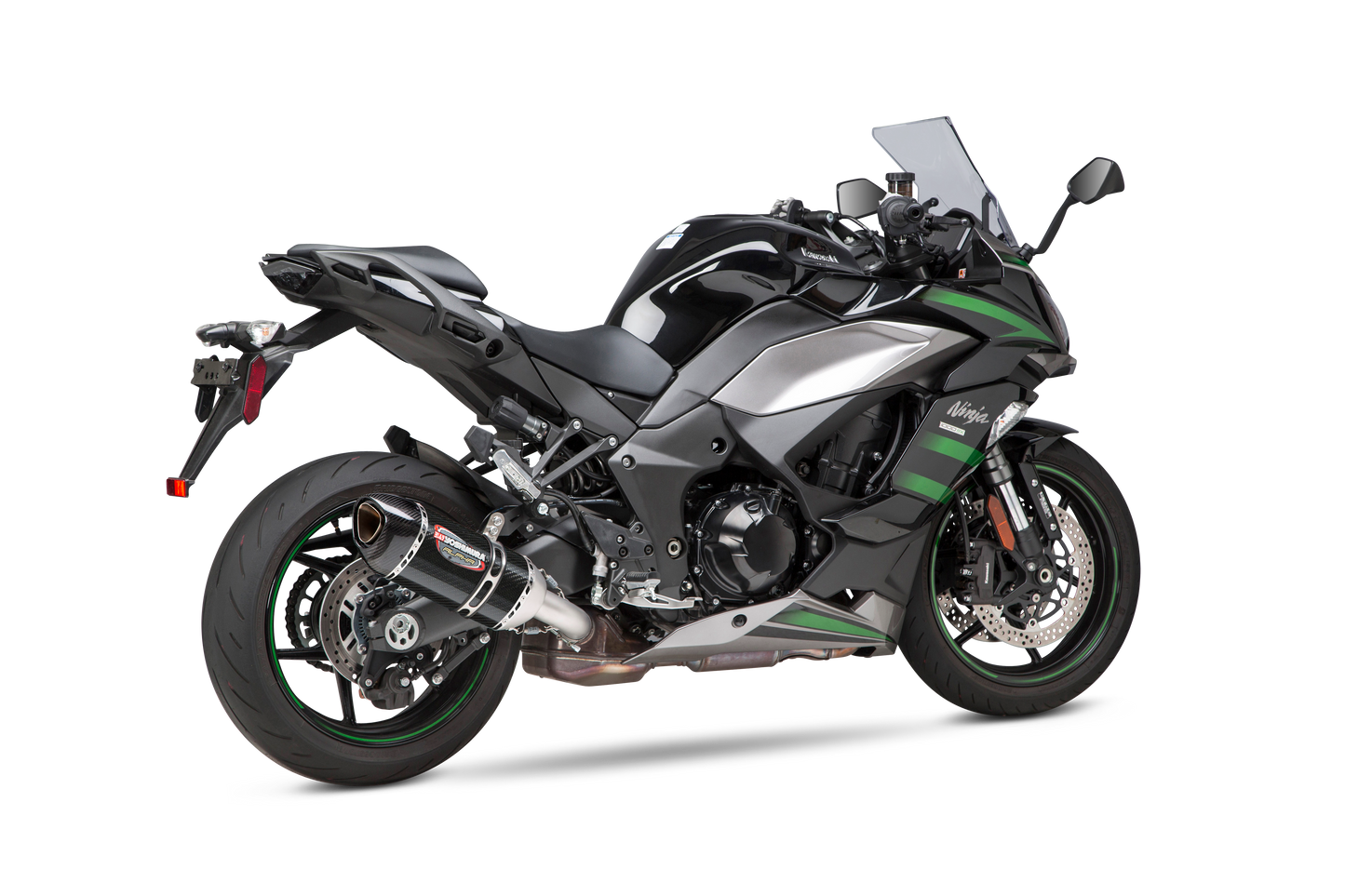 YOSHIMURA RS-12 ADV Street Alpha slip-on exhaust for Kawasaki with matte carbon fiber end cap, showcasing sleek motorcycle exhaust design.