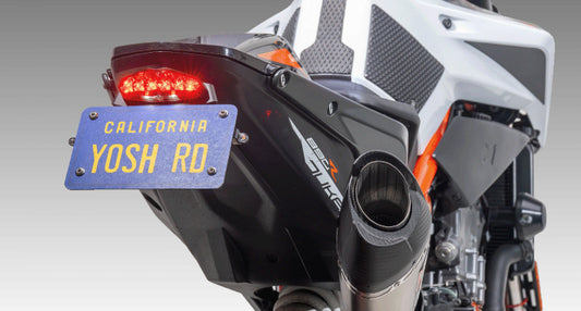 YOSHIMURA Fender Eliminator V2 for KTM motorcycle, sleek black rear license plate holder with integrated lighting.
