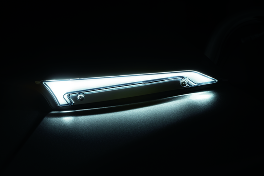 Kuryakyn Tracer Windshield Trim Lights in chrome with fully diffused LED lighting on a 2015+ Road Glide motorcycle.