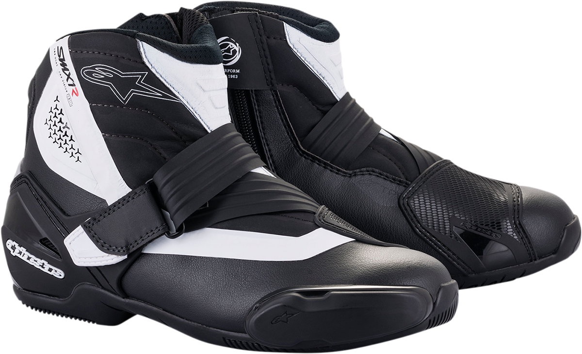 Alpinestars SMX-1 R v2 motorcycle racing boots in black and white, US 8 / EU 42, shown from side view.