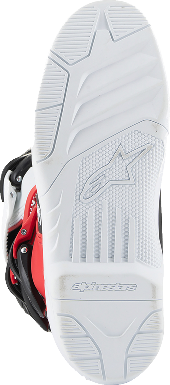 Alpinestars Youth Tech3S motocross boots in white, black, and red for junior riders, featuring protective design and secure fastenings.
