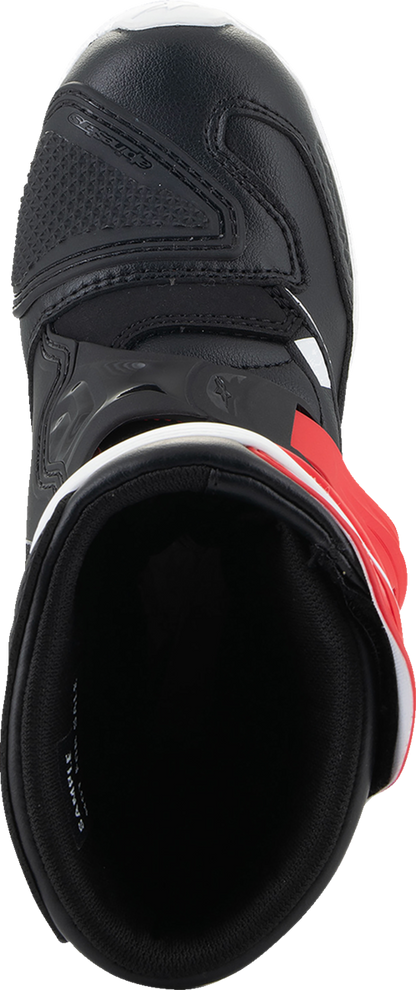 Alpinestars Kids Tech 3S motorcycle boots in red, black, and white with adjustable straps and protective features.