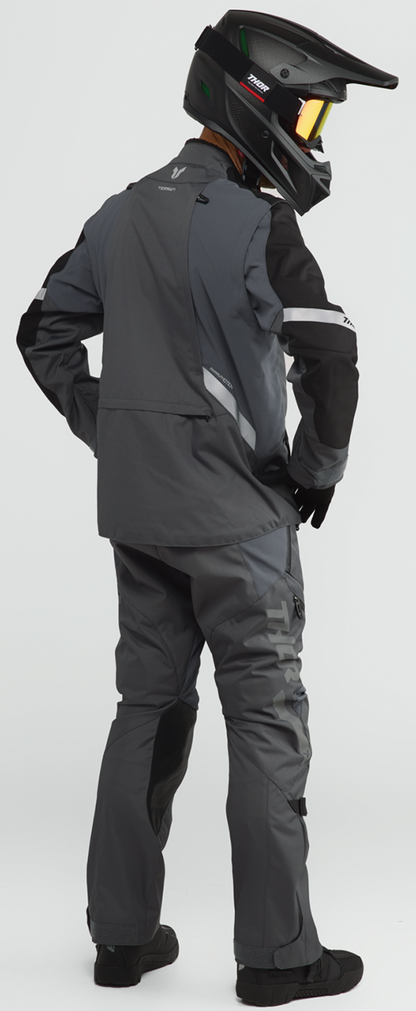 THOR Terrain over-the-boot pants in charcoal, US size 46, showing durable motorcycle riding gear with reinforced knee areas.
