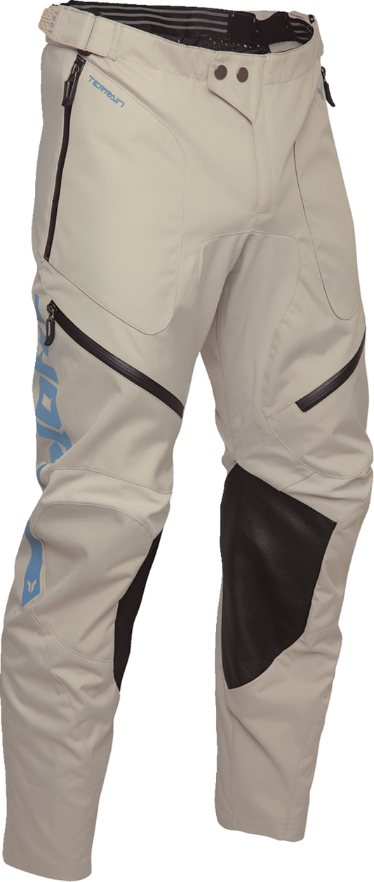 THOR Terrain in-the-boot riding pants in sand color, US size 44, featuring durable fabric and motorcycle gear design