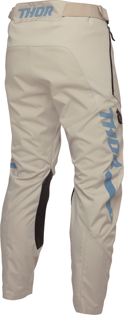 THOR Terrain In-the-Boot Pants in sand color, US size 38, featuring durable fabric and functional design for off-road riding.